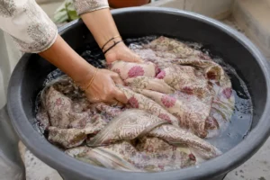 Hand washing a hand block printed saree in cold water