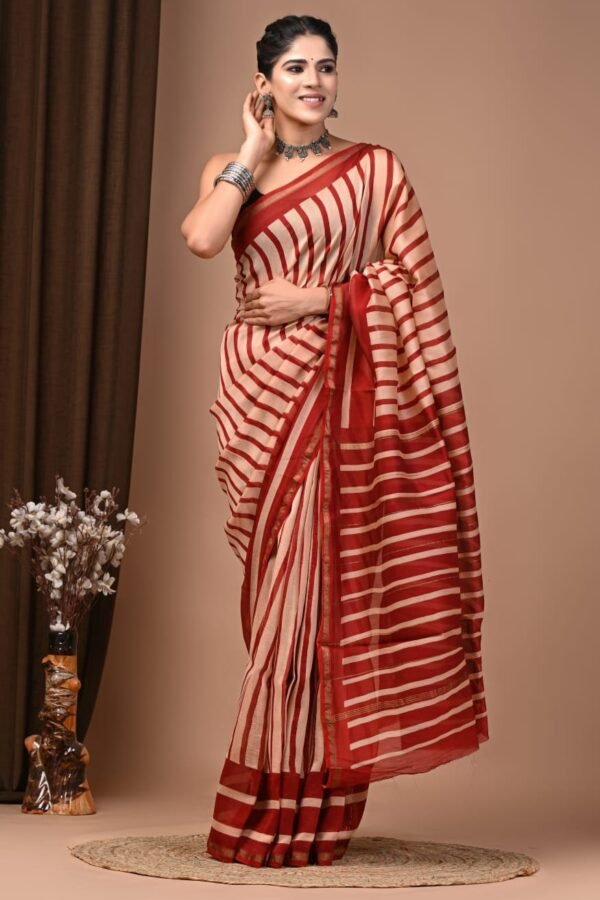 Cream and maroon striped Chanderi silk saree with hand block print and gold zari lines