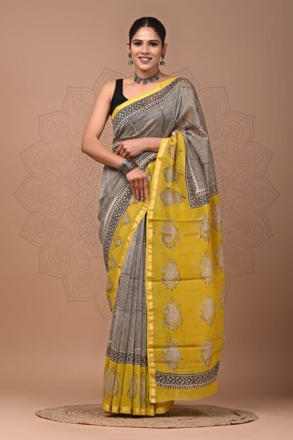 Woman wearing black and yellow Chanderi silk saree with hand block printed geometric and paisley motifs