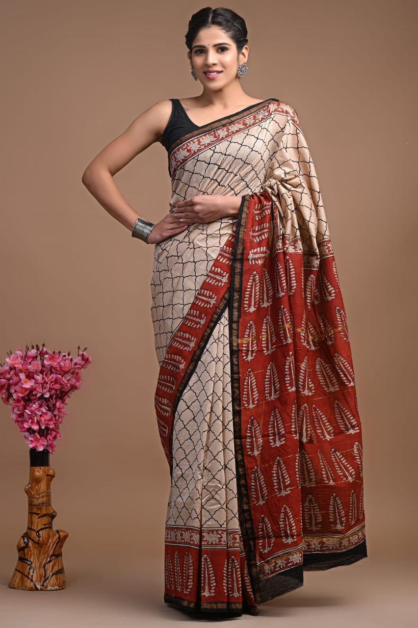 Cream Chanderi silk saree with black lattice print and rust-red Bagru leaf motif border