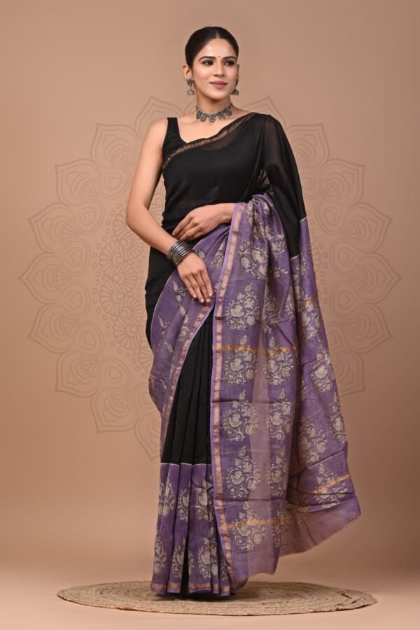 Woman wearing black Chanderi silk saree with lavender Bagru block printed floral pallu