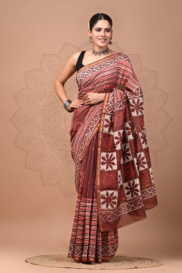 Woman in mauve-brown Bagru hand block print Chanderi silk saree with floral checkered pallu