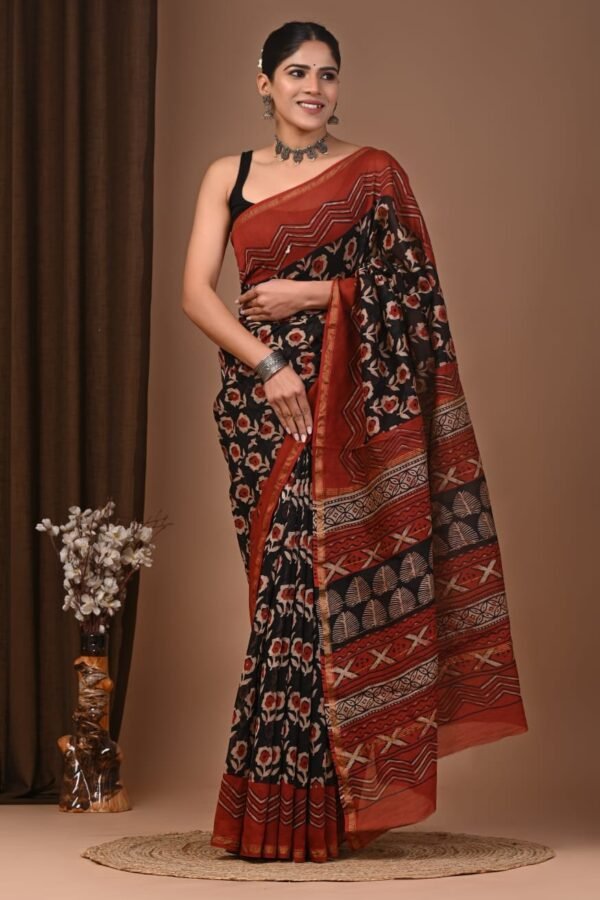Black Chanderi silk saree with rust-red floral booti print and zigzag border, Bagru hand block print