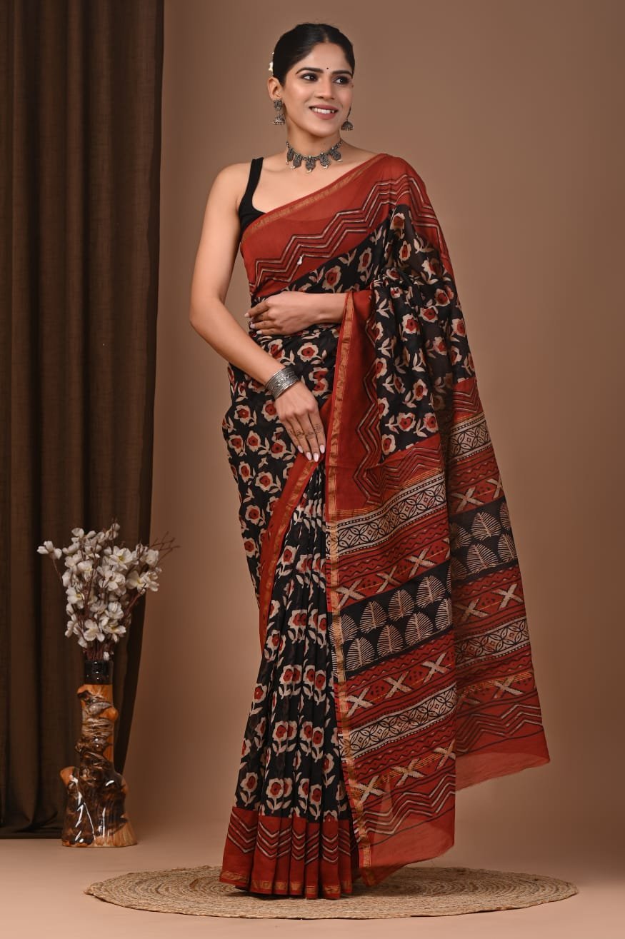 Black Chanderi silk saree with rust-red floral booti print and zigzag border, Bagru hand block print