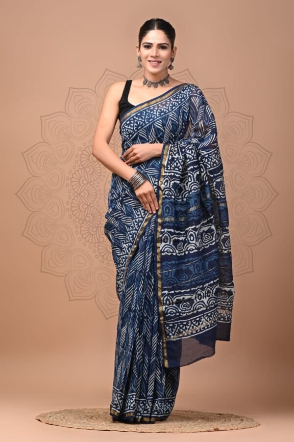 Woman wearing indigo blue Chanderi silk saree with white leaf print, Bagru hand block print