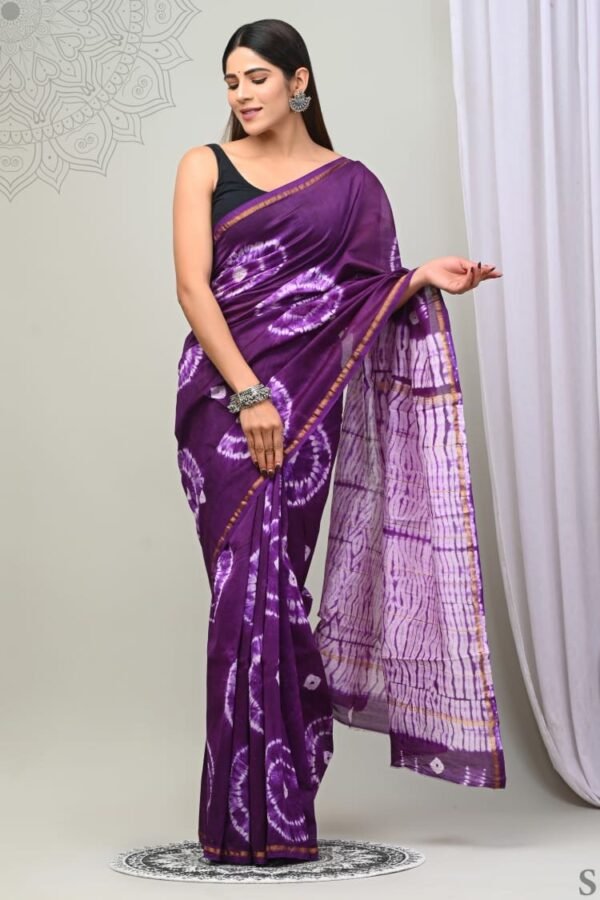Woman draped in purple Chanderi silk saree with Bagru block printed circular swirl motifs