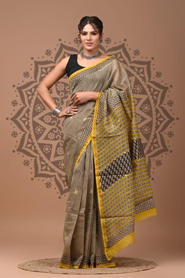 Beige Chanderi silk saree with black Bagru hand block geometric stripe print and yellow border