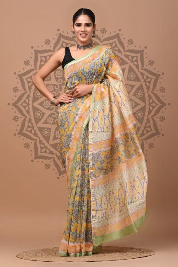 Off-white Chanderi silk saree with yellow floral print and green border, hand block printed