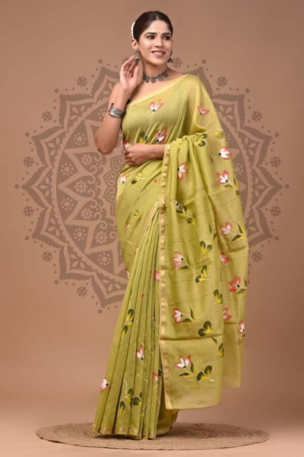 Woman draped in olive green Chanderi silk saree with Bagru hand block floral print and gold border
