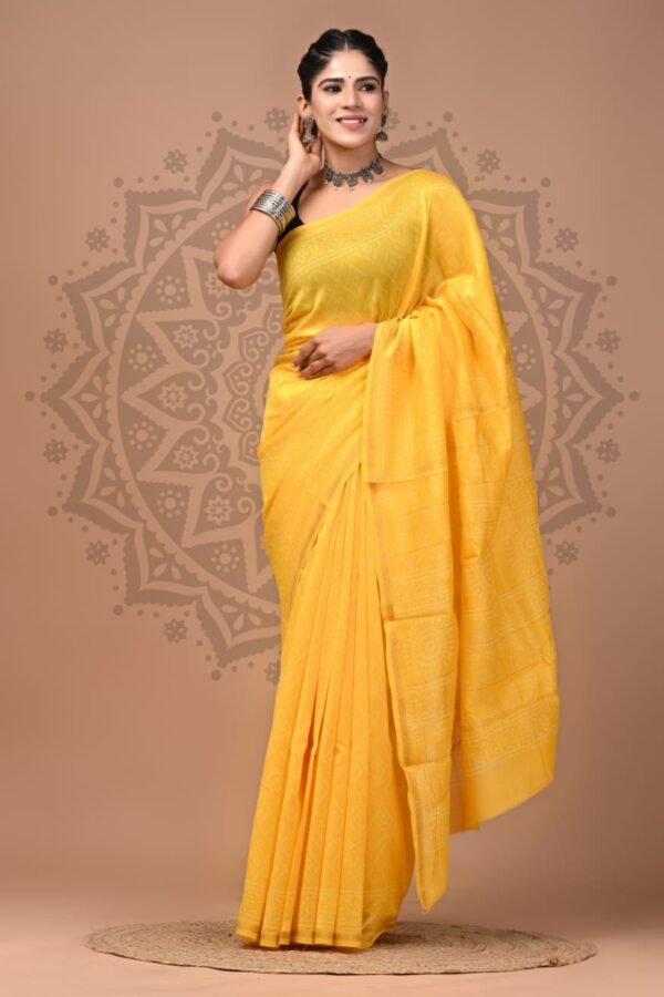Woman draped in yellow Chanderi silk saree with tonal geometric hand block print