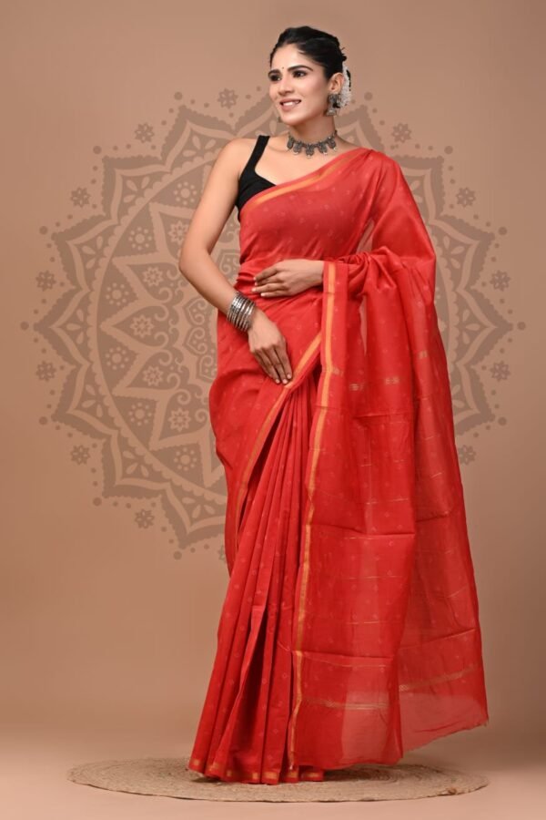 Woman draped in red Chanderi silk saree with tonal booti print and gold border