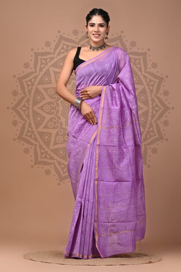 Woman draped in lavender Chanderi silk saree with white floral booti hand block print