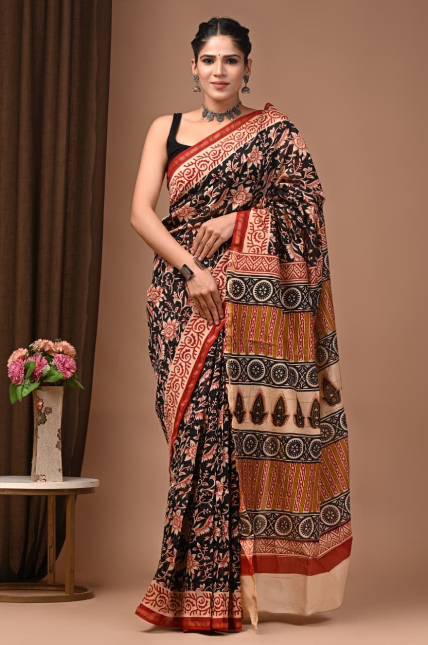 Woman draped in black Chanderi silk saree with Bagru hand block floral and medallion print pallu
