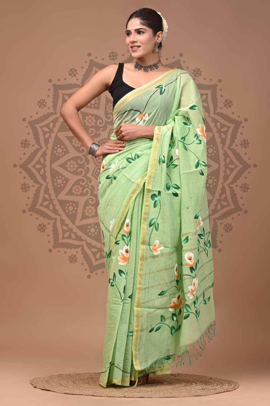 Pastel green Chanderi silk saree with Bagru hand block floral vine print and gold-toned border