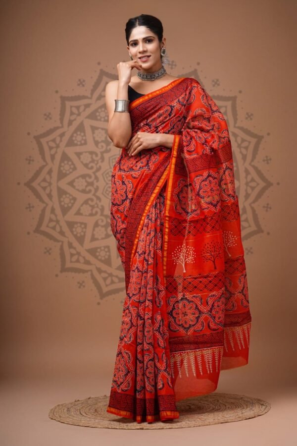 Woman wearing red Chanderi silk saree with navy floral medallion Bagru hand block print