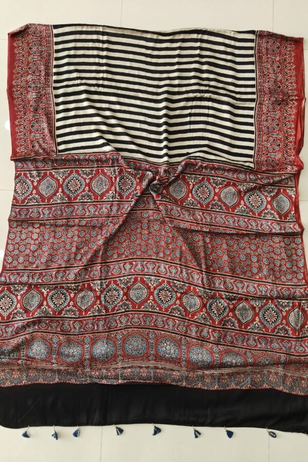 Ajrakh print pure modal silk saree with black white stripes and rust-red floral border with tassels