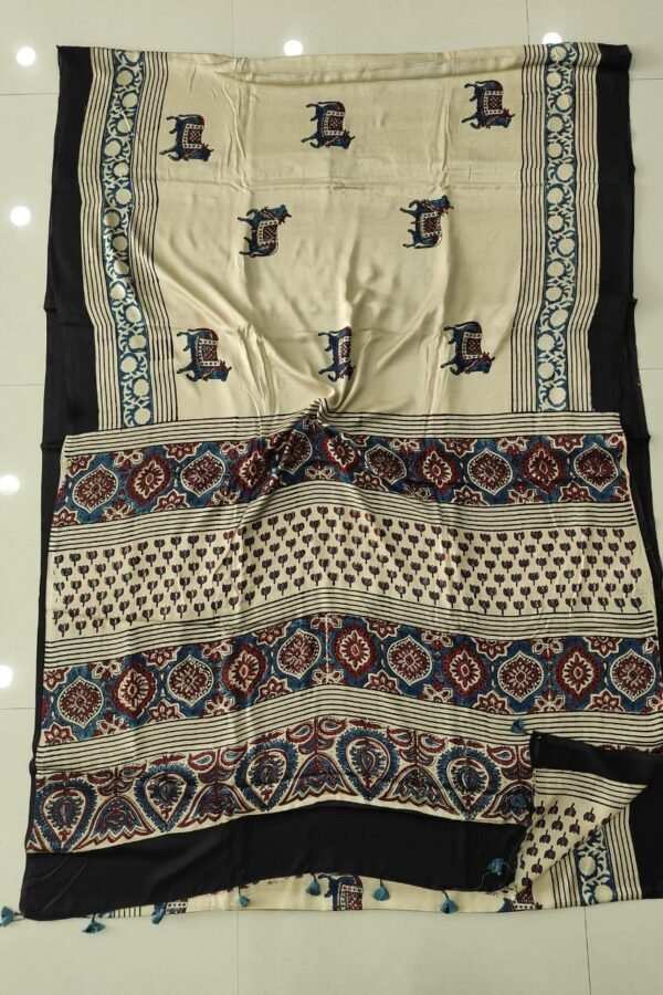 Cream Ajrakh print modal silk saree with elephant motifs and floral medallion pallu