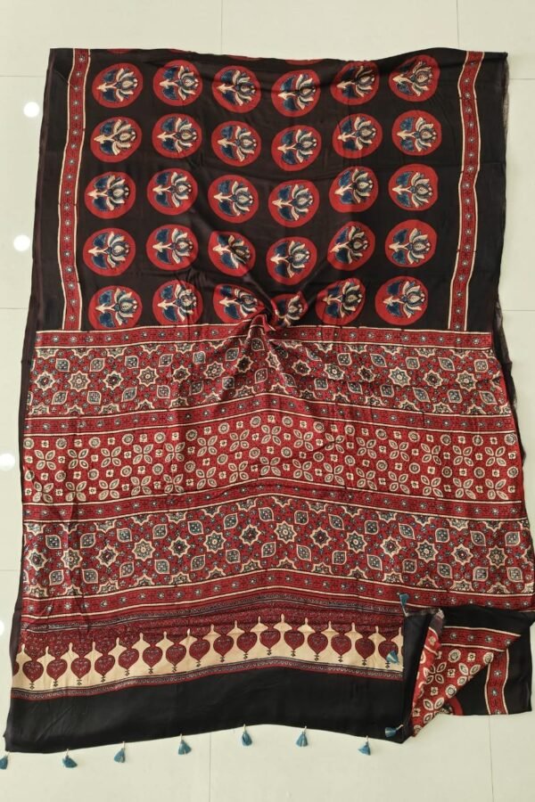 Black Ajrakh print Modal silk saree with red floral medallions and patterned red pallu