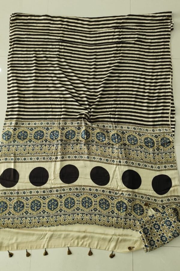 Black and cream striped Ajrakh print Modal silk saree with circular medallion border, laid flat