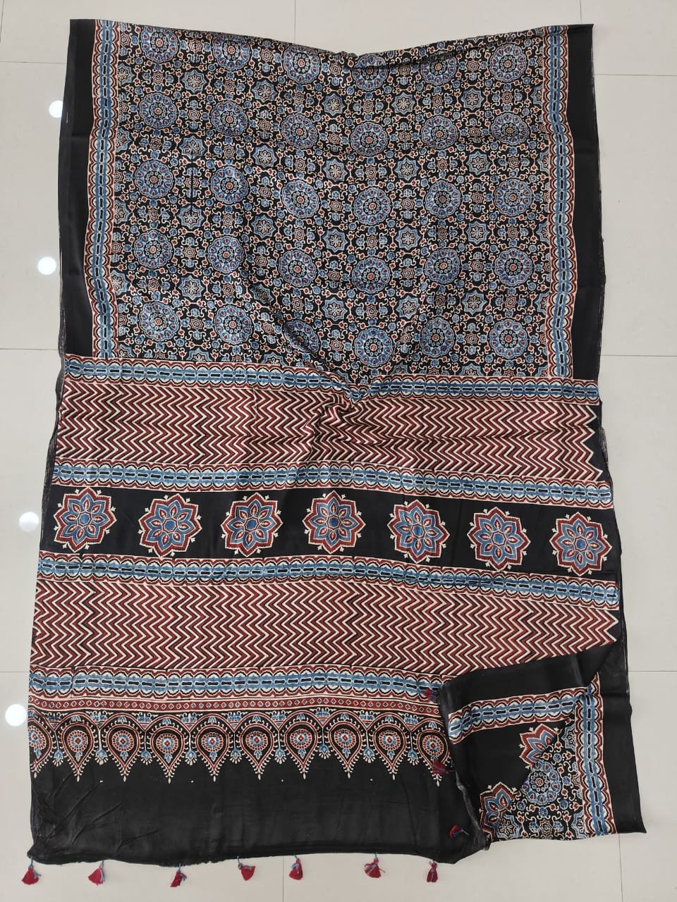 Black Ajrakh print Modal Silk saree with floral medallions and star-flower rosette border