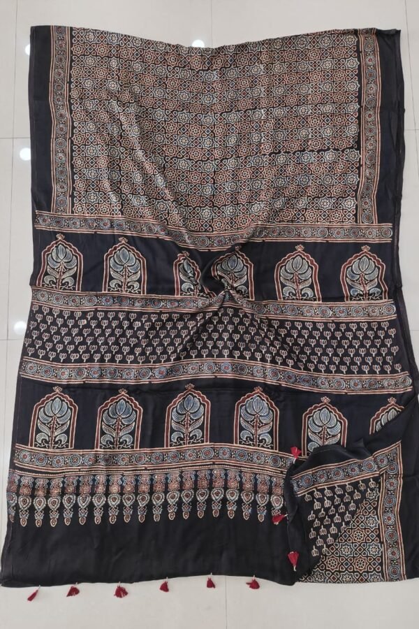 Black Ajrakh print modal silk saree with temple arch pallu motif laid flat, full view