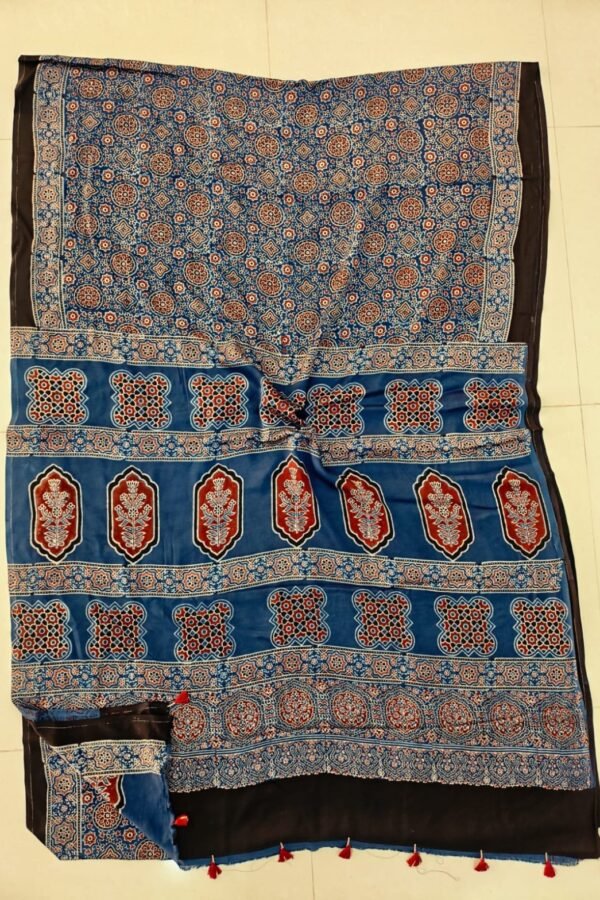 Steel blue Ajrakh print pure Modal silk saree with rust-red medallion pallu and black border