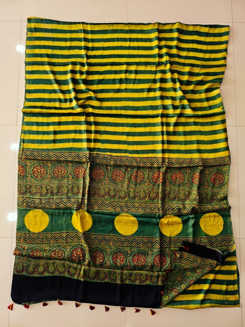 Yellow and green striped Ajrakh print silk saree with floral pallu and navy border