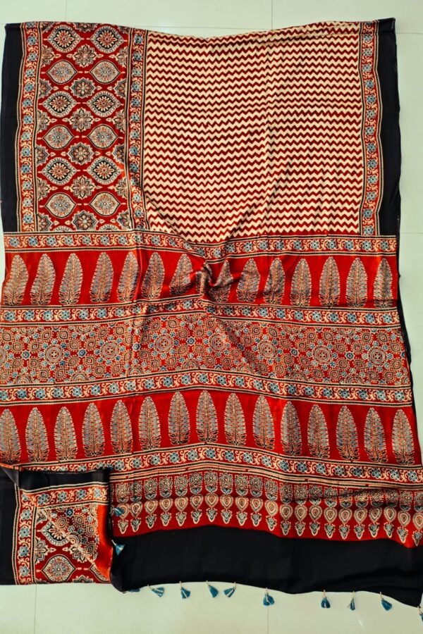 Maroon and cream chevron Ajrakh print silk saree with leaf motif pallu and black border
