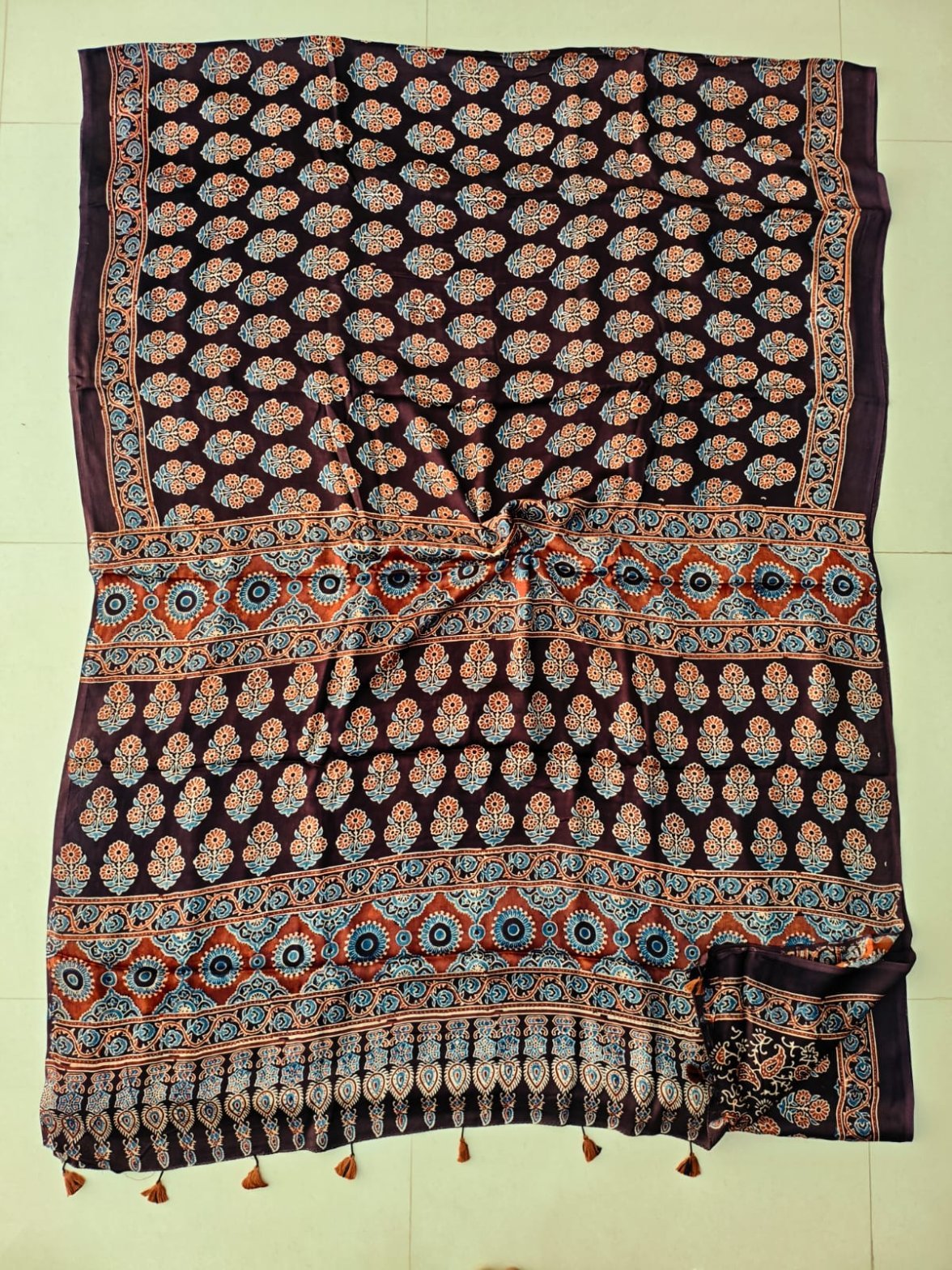 Aubergine brown Ajrakh print Modal silk saree with floral booti and circular medallion pallu border