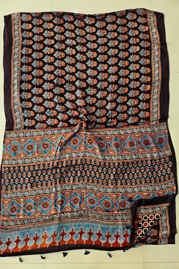 Dark brown Ajrakh print Modal silk saree with floral booti and blue medallion pallu border