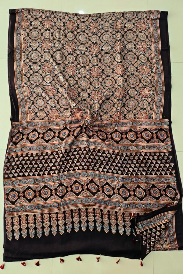 Dark brown Ajrakh print pure Modal Silk saree with circular floral medallions and maroon tassels