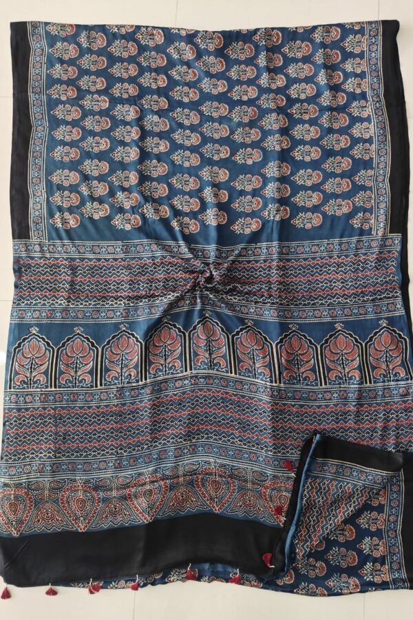 Indigo blue Ajrakh print silk saree with temple arch pallu and maroon tassels
