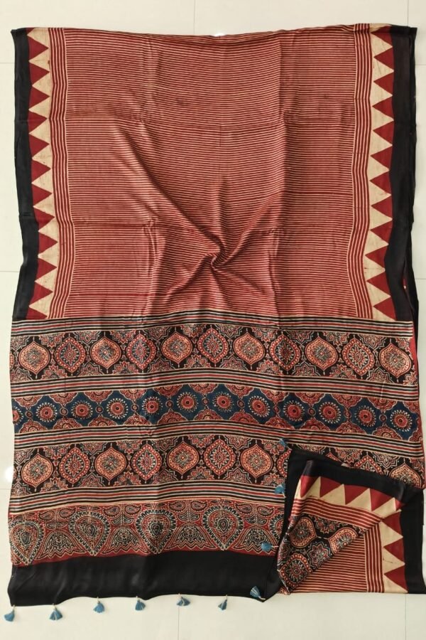 Rust red striped Ajrakh print pure Modal silk saree with medallion pallu and blue tassels