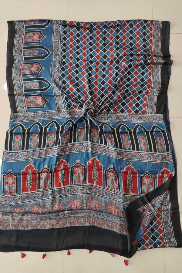 Blue Ajrakh print pure modal silk saree with diamond lattice and temple arch motifs, black border, pink tassels