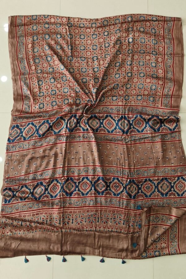 Beige and blue Ajrakh print pure Modal silk saree with floral medallion border and tassels