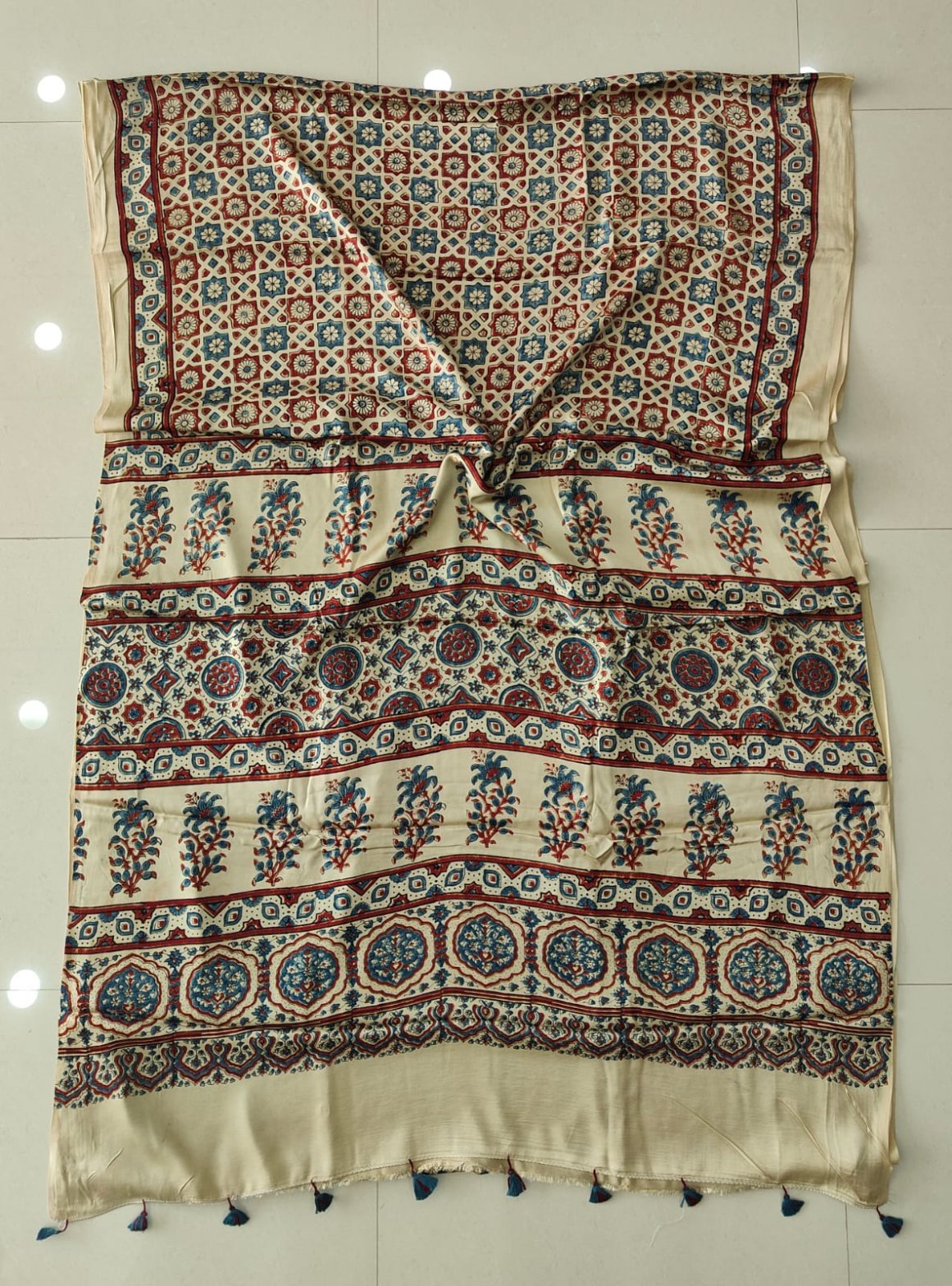 Ivory Ajrakh print Pure Modal Silk saree with blue-red star lattice and medallion pallu border