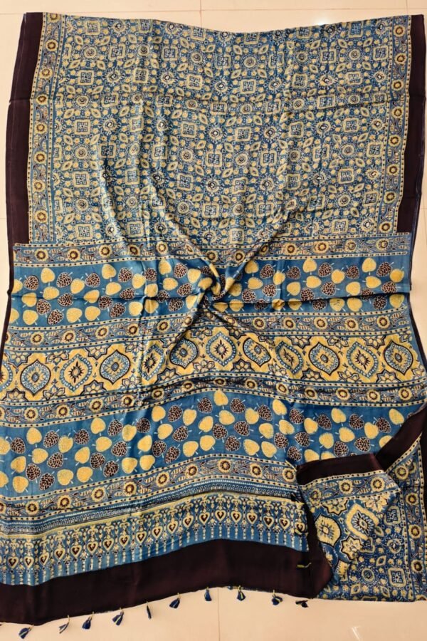 Teal blue Ajrakh print pure Modal silk saree with plum border and tasseled pallu