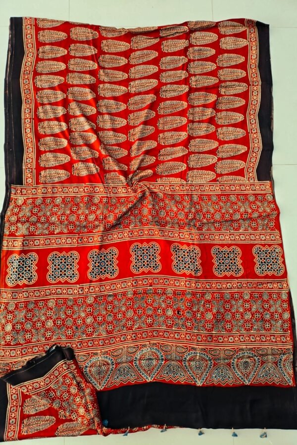 Red and black Ajrakh print Pure Modal Silk saree with feather motifs and leaf border pallu