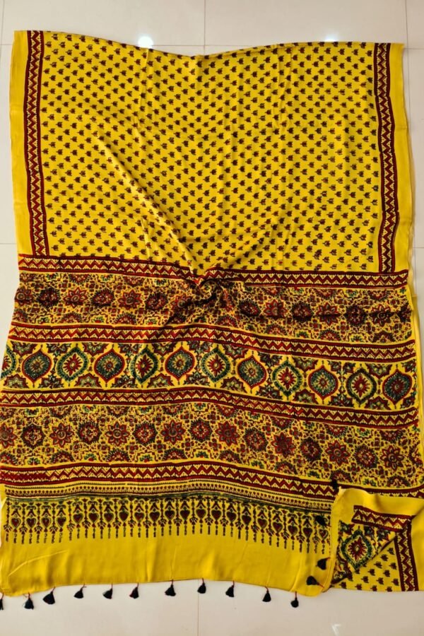 Yellow Ajrakh print pure Modal silk saree with floral booti body and heart finial pallu border