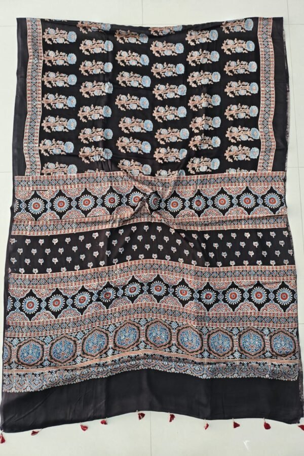 Black Ajrakh print Modal silk saree with blue floral bouquet motifs and octagonal medallion pallu border