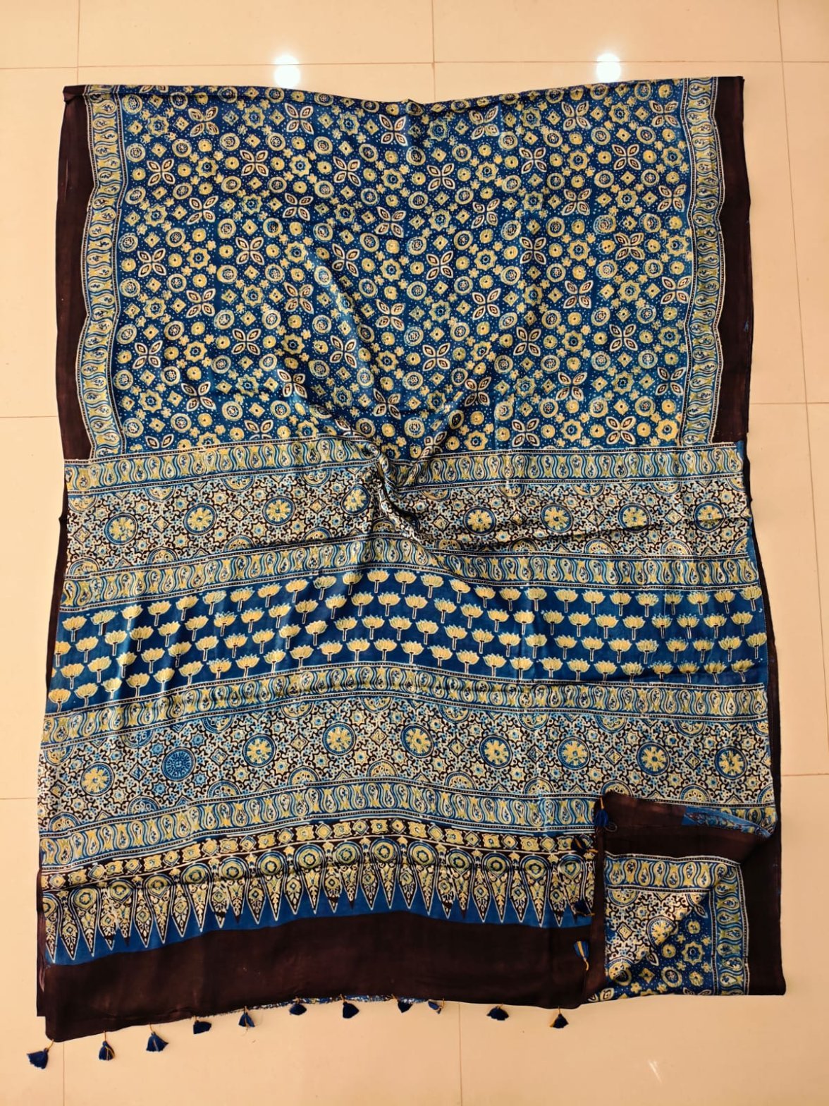 Blue Ajrakh print Modal silk saree with floral medallion body and lotus pallu border