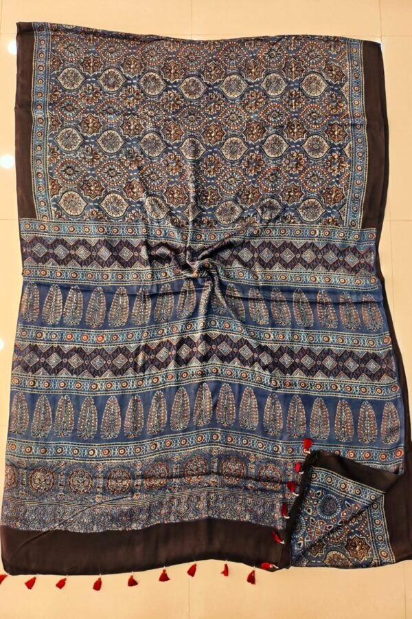 Blue and black Ajrakh print pure Modal silk saree with octagonal medallion body and feather motif pallu