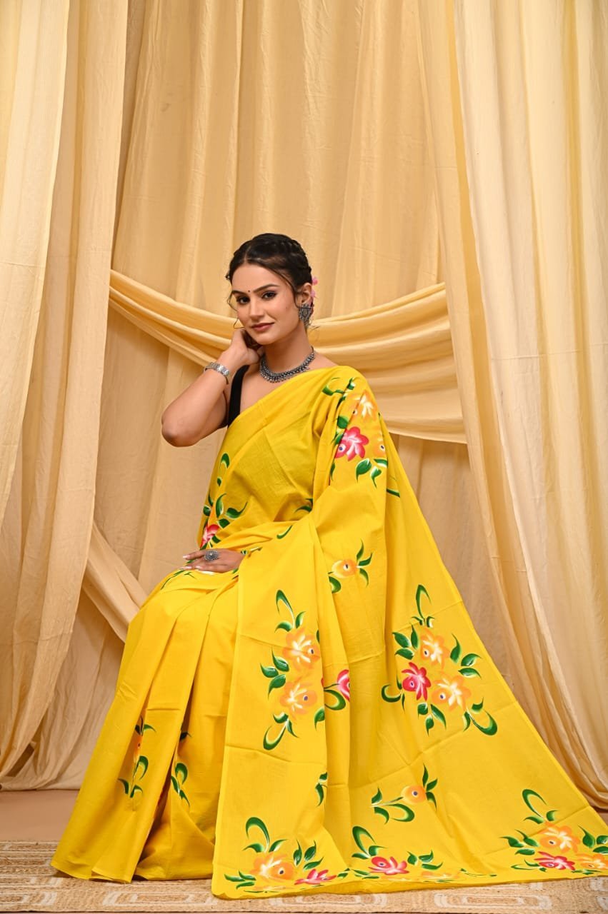 Woman in yellow mul cotton saree with hand block floral bouquet print, Bagru print style