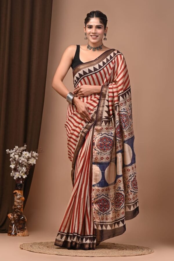 Rust-red pinstriped hand block printed Maheshwari silk saree with navy medallion pallu