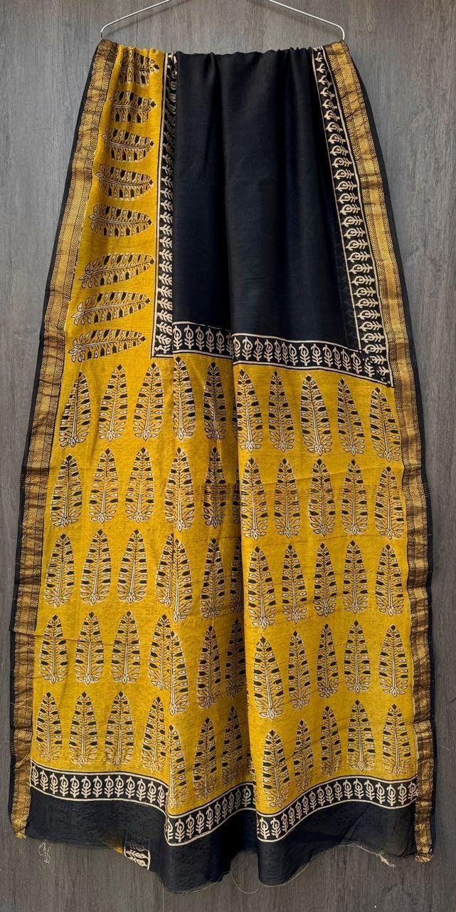Mustard yellow hand block printed Maheshwari silk saree with black feather motifs and zari border