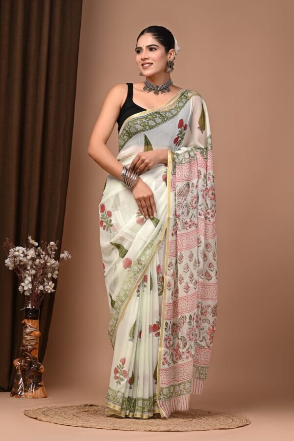 Ivory hand block printed chiffon saree with floral booti and green floral border