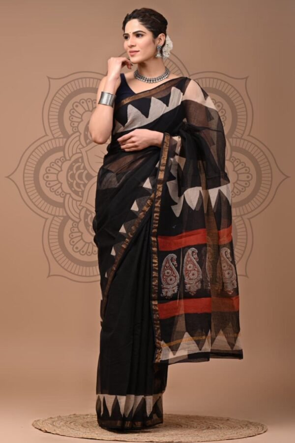 Black Kota Doria cotton saree with triangle temple border print and paisley pallu, styled with jewelry