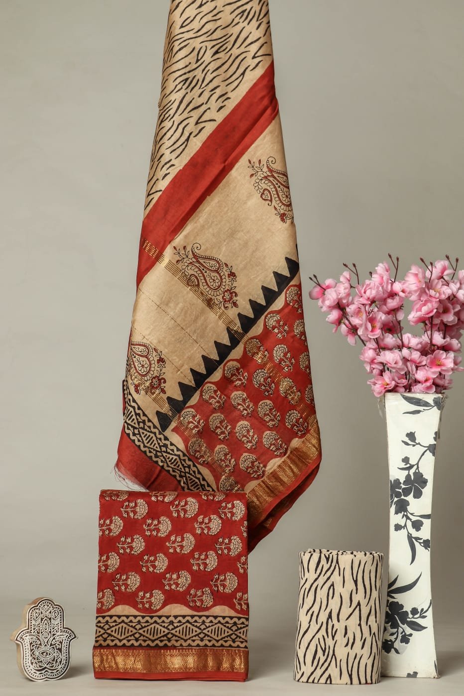 Beige and rust hand block printed Maheshwari silk suit dress material with paisley motifs and golden zari border