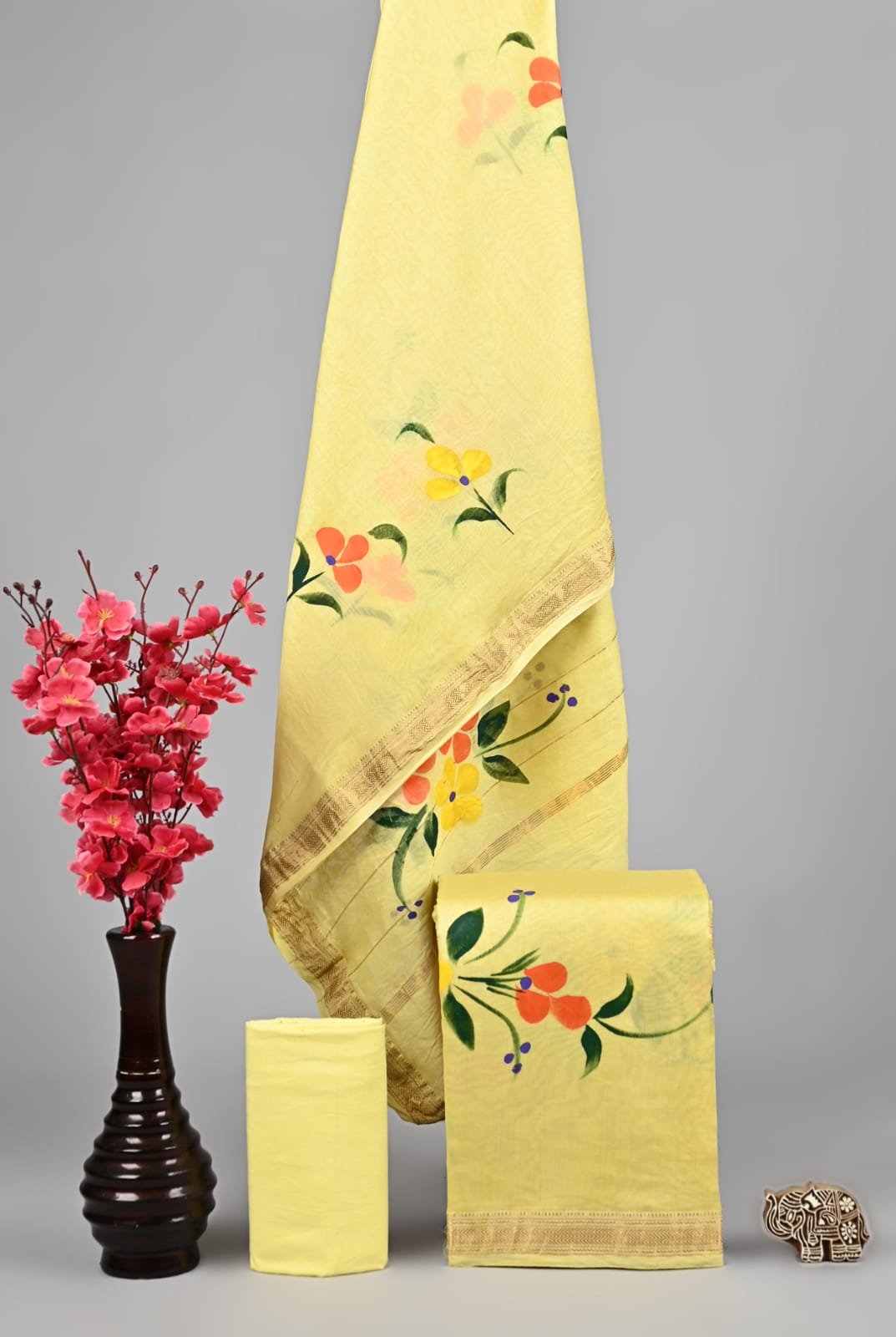 Pale yellow Maheshwari silk suit dress material with hand-painted floral print and golden zari border