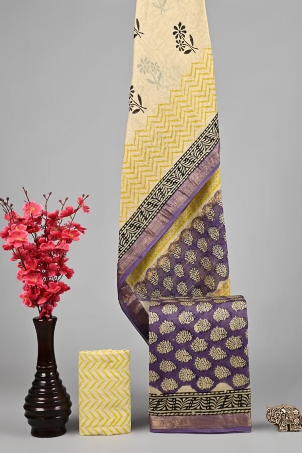 Cream and purple hand block printed Maheshwari silk suit dress material with golden zari border